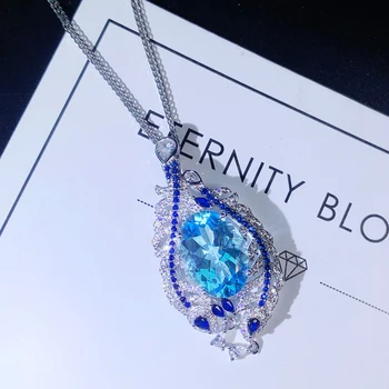 Сребро с инкрустирани овалния натурален небето-син топаз, пълно диамантена огърлица, окачване за дамите, леки луксозни изискани вечерни банкетни бижута
